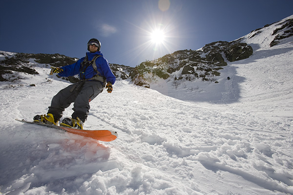 A snowboarder in Tuckerman Ravine in New Hampshire's White Mountains.
