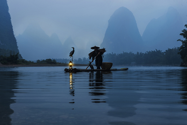 A fisherman on the Li River outside Xingping, Guilin Province, China