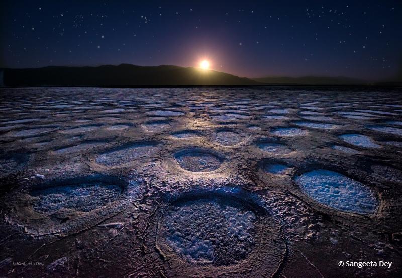 Today’s Photo Of The Day is “The Court Of Moon” Sangeeta Dey. Location: Cottonball Basin, Death Valley National Park, CA. 