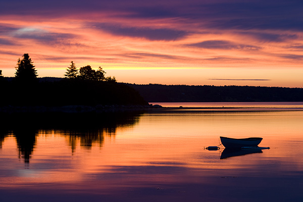 A skiff at sunrise in Eggemoggin Reach in Little Deer Isle, Maine.