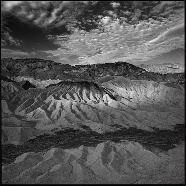 Black and white image of Zabriskie Point from overhead in Death Valley National Park California landscape 