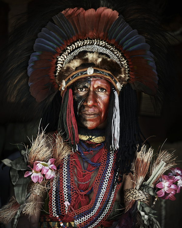 Portrait of a Goroka tribesman Eastern Highlanders are considered the friendliest people of the highlands with fewer tribal fights than other provinces. Territorial conflicts arise not only with other tribes. Also western colonialism, mining and the advancing developing world threatens their culture. The territory of villages and tribes - the land they lived on and that provided them with food and shelter for thousands of years - is something the highlanders have always defended with their lives. A threat from any foreigner will make them feel forced to fight back.