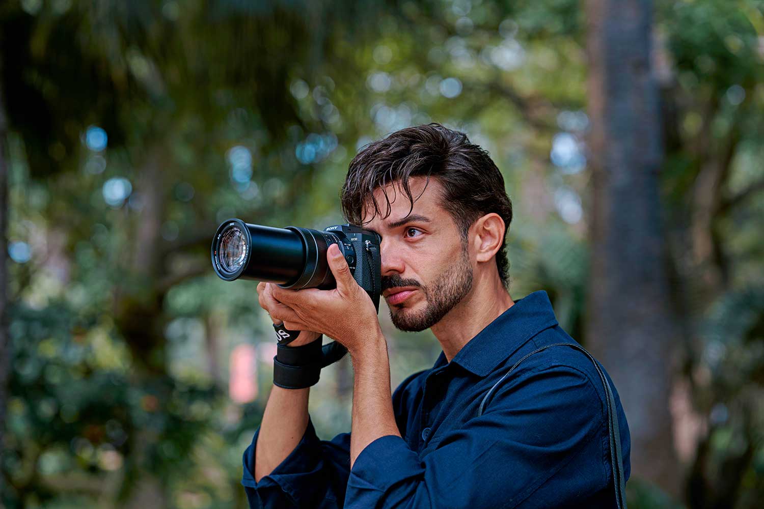 Photo of someone using the Sony RX10 V camera